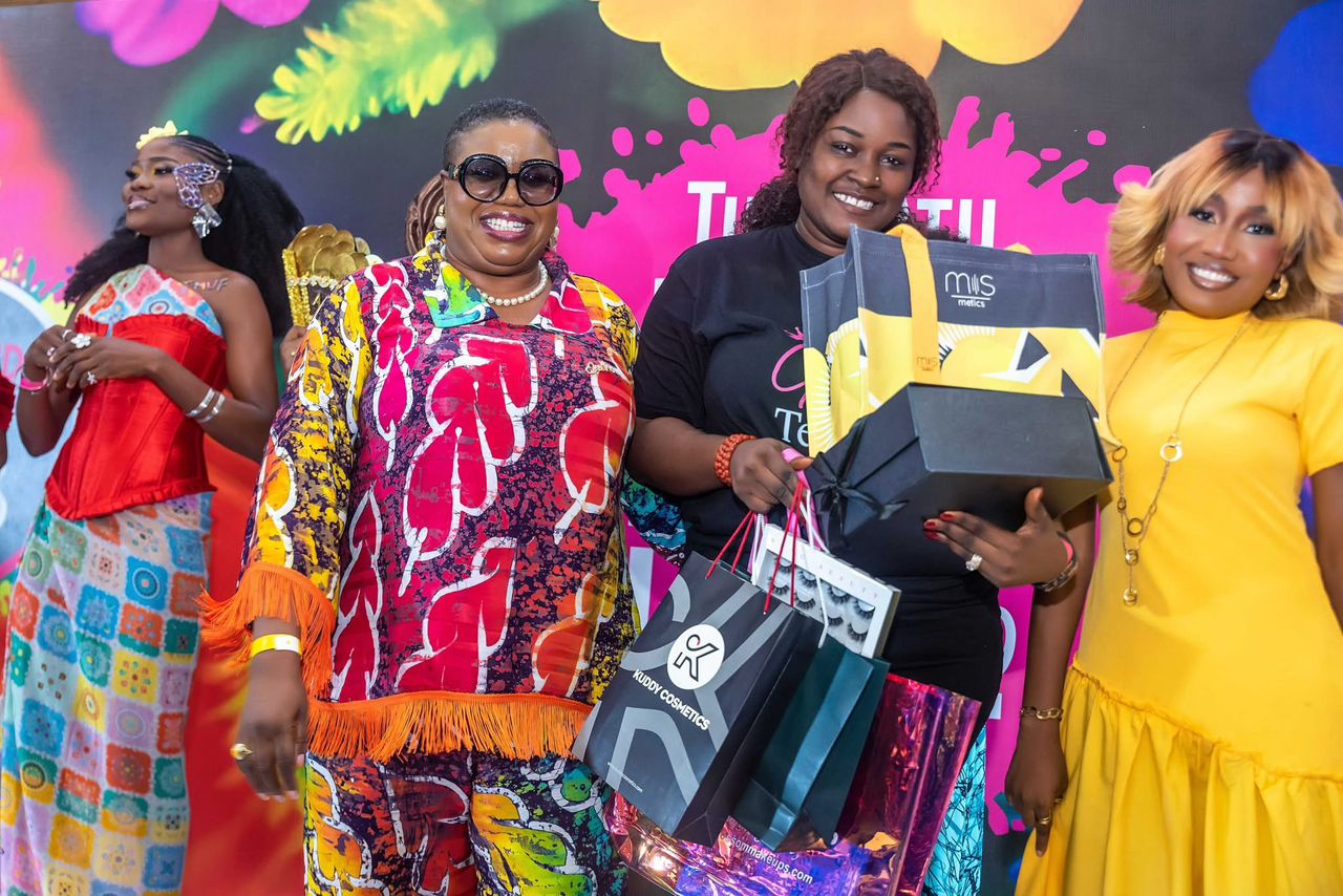 BFOC organisers presenting gift bags to a participant