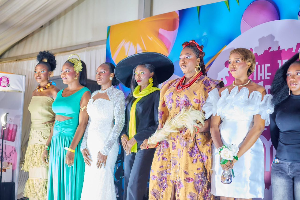 Models lined up showcasing competition looks