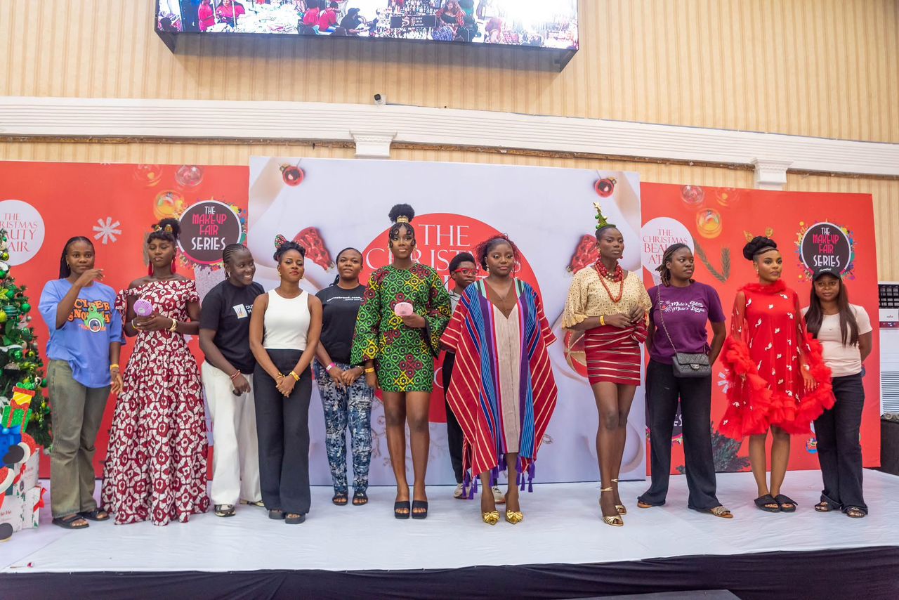 Competing artists on stage at The Christmas Beauty A'Fair
